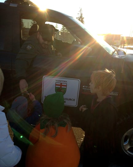 Kids with Manitoba Sustainable Development in Churchill on Halloween.