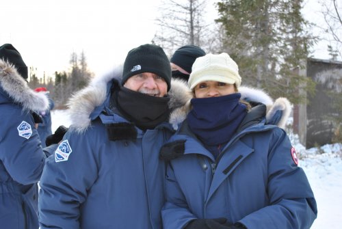 A couple wearing Canada Goose jackets in Churchill