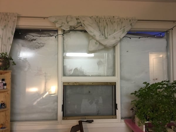 The main floor of this resident's house is completely snow covered