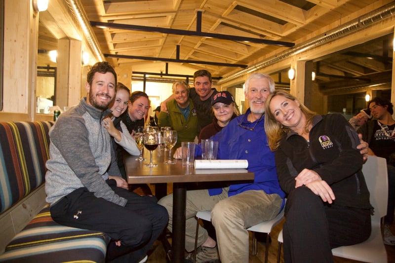 Guests enjoy drinks in the Tundra Buggy Lodge lounge