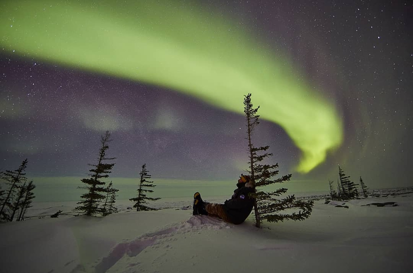 Enjoying the view of the northern lights in Churchill, Canada
