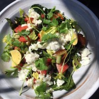 A salad of locally sourced fresh vegetables.