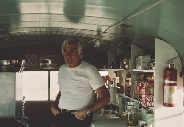 Dan Guravich standing in the original kitchen.